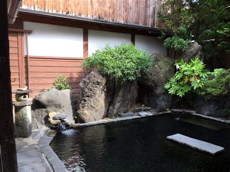 How to Experience a Japanese Ryokan Onsen - TravelingMel