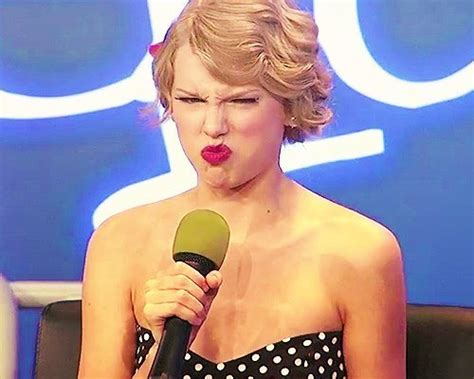 post a pic of taylor looking mad or angry or disgusted of something ...