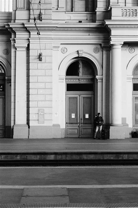 A black and white photo of a train station photo – Free Film ...