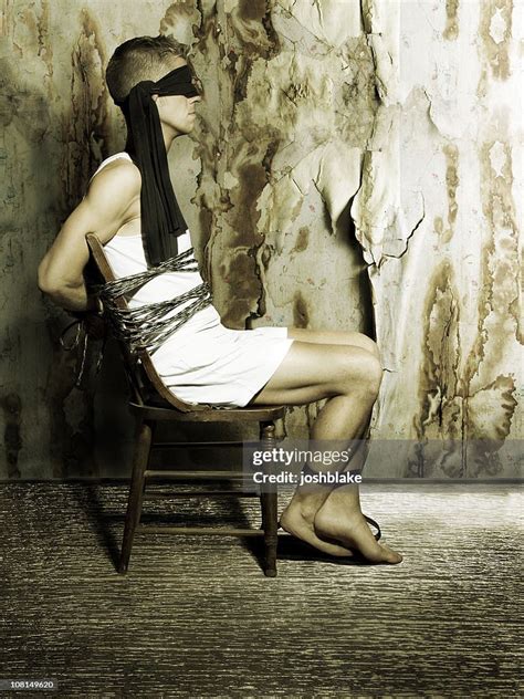 Blindfolded Man Sitting In Chair High-Res Stock Photo - Getty Images