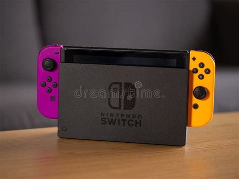 UK - Feb 2020: Nintendo Switch Purple and Orange Joy Con and Portable ...