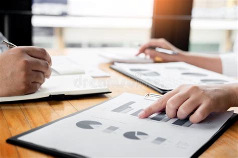 Business Man Analysed Report of Profit Finance Data Graph Document in His Office. Stock Image ...