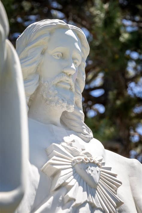 Close Up of a Stone Headstone of Jesus Christ with the Sacred Heart at ...