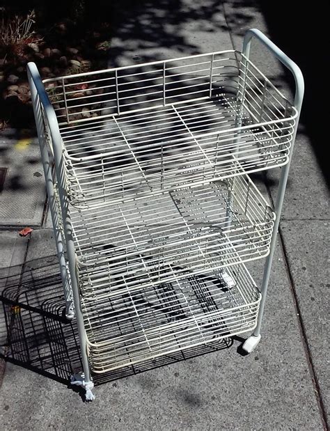 UHURU FURNITURE & COLLECTIBLES: SOLD 3 1/2' Tall Wire Cart on Wheels - $25