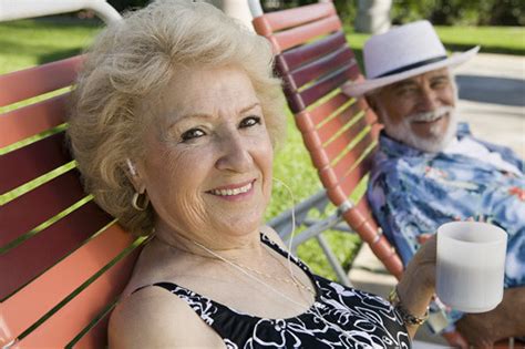 10070039 | Senior Couple sitting on lawn chairs, woman liste… | Flickr