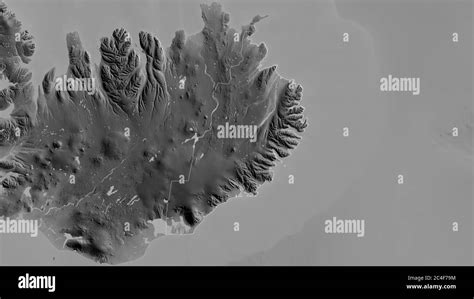 Austurland, region of Iceland. Grayscaled map with lakes and rivers. Shape outlined against its ...