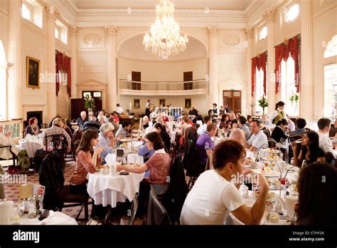 People having afternoon tea in the Bath Pump room tea rooms restaurant, Bath Somerset UK Stock ...