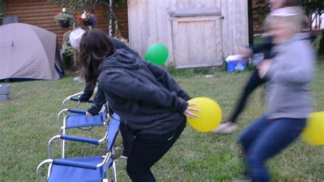 Adults Play Funny Game with Balloons | Jukin Media Inc