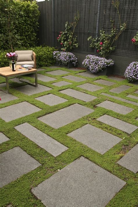 Bluestone slabs and groundcover gives a carpet effect in this cosy courtyard Front Yard Garden ...