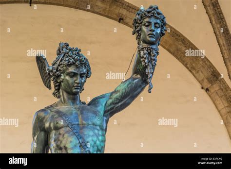 the bronze statue of David hanging the head of Goliath Stock Photo ...