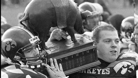 Photos: Hawkeyes-Gophers Floyd of Rosedale trophy over the years