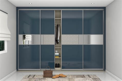 Modern Spacious Wardrobe Design With Sliding Doors | Livspace