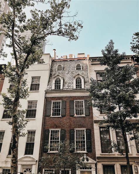 an old brick building with many windows