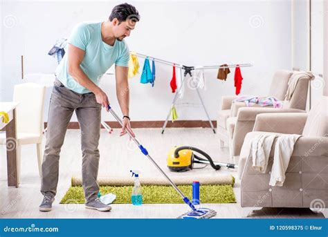 Man Cleaning House from Mess Stock Image - Image of dust, hygiene: 120598375