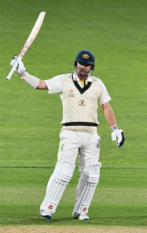 Travis Head celebrates after reaching fifty | ESPNcricinfo.com