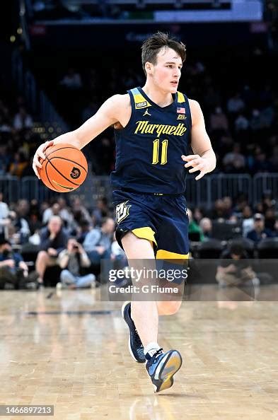 Tyler Kolek of the Marquette Golden Eagles handles the ball against ...