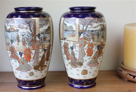 Pair of Japanese Hand Painted Kinkozan Satsuma Vases.