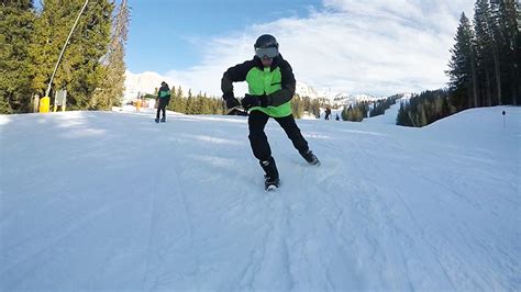 turn your shoes into mini skis with snowfeet, a combination of skis and skates