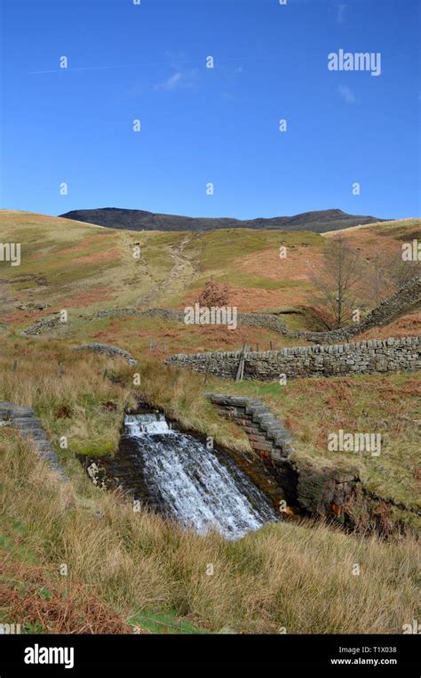 Kinder Scout waterfall flowing into the reservoir, Derbyshire Stock ...