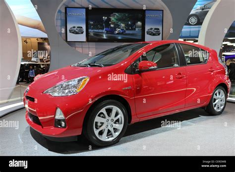 toyota prius hybrid car red Stock Photo - Alamy