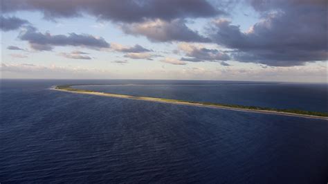 Reao, aerial drone video of the atoll and village, Tuamotu, Polynesia ...