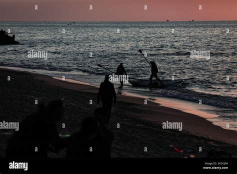 Palestinian fishing boats in the Gaza sea at sunset in Gaza City ...