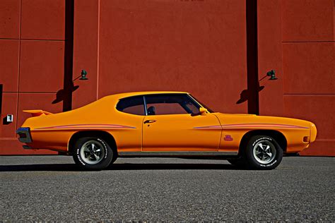 Seeing Double: One Restored, One Original Orbit Orange 1970 Pontiac GTO ...