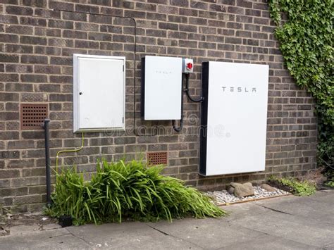 Tesla Powerwall 2 and Backup Gateway 2 on a House Wall Editorial ...