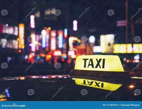 Taxi Cap Sign Taxi Stand Service at Night City Town Nightlife Stock Image - Image of lighting ...