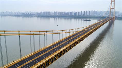 World's longest double-deck suspension bridge opens to traffic - CGTN