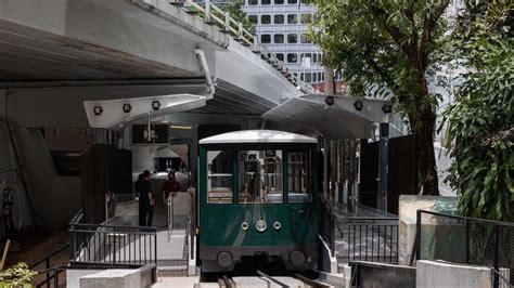 Hong Kong's Peak Tram reopens after 14 months - BBC News