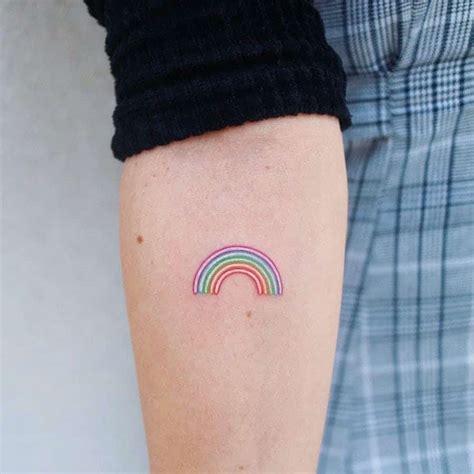 Share 53+ small rainbow tattoo latest - in.cdgdbentre