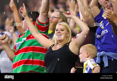 Warrington Wolves fans in the stands Stock Photo - Alamy