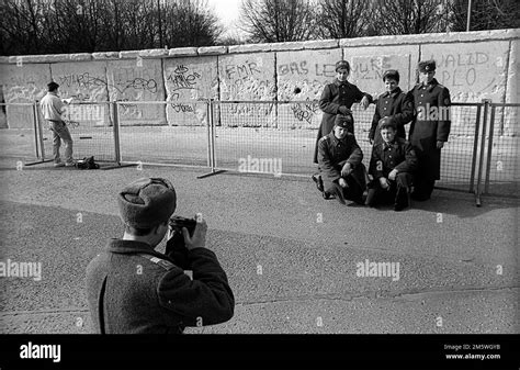 GDR, Berlin, 23. 02. 1990, Soviet (Russian) soldiers taking photos of ...