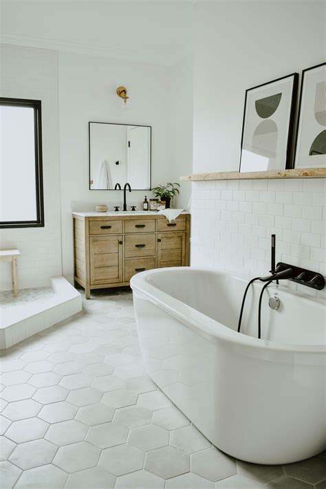 bathroom remodel, white bathroom, white subway tile wall, matte black tub filler, white free ...