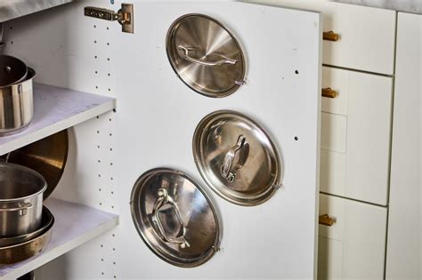 Pot Lid Command Hook Hack - Cabinet Trick | Kitchn