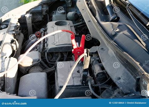 A Car Battery Jumper Cables with Copper Clamps Attached To the ...