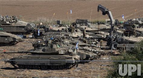 Photo: Israeli tanks in staging area with tanks near the Gaza border - ISR2023101810 - UPI.com