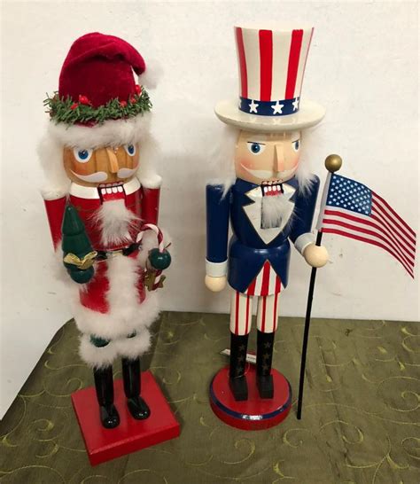 pair HANDMADE GERMAN HOLIDAY NUTCRACKERS | EstateSales.org