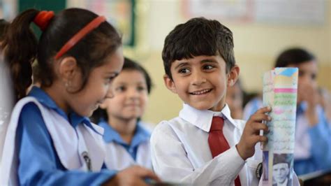 Pakistani children in schools using educational supplies by int’l ...