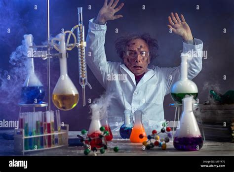 sad scientist with a failed experiment after the explosion in the lab Stock Photo - Alamy