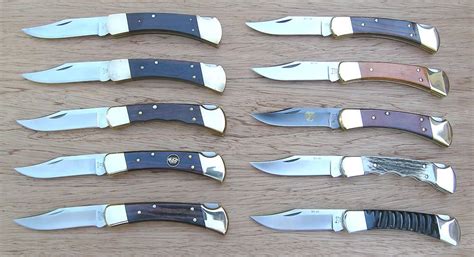 A collection of Buck Model 110 lock-back folding knives | Knife, Folding knives, Buck 110