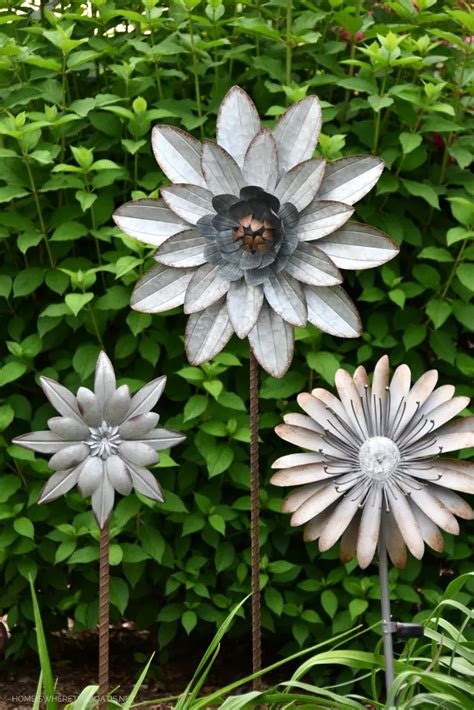 How to “Grow” Whimsical Garden Flower Stakes from Metal Wall Art | Metal flowers garden, Metal ...