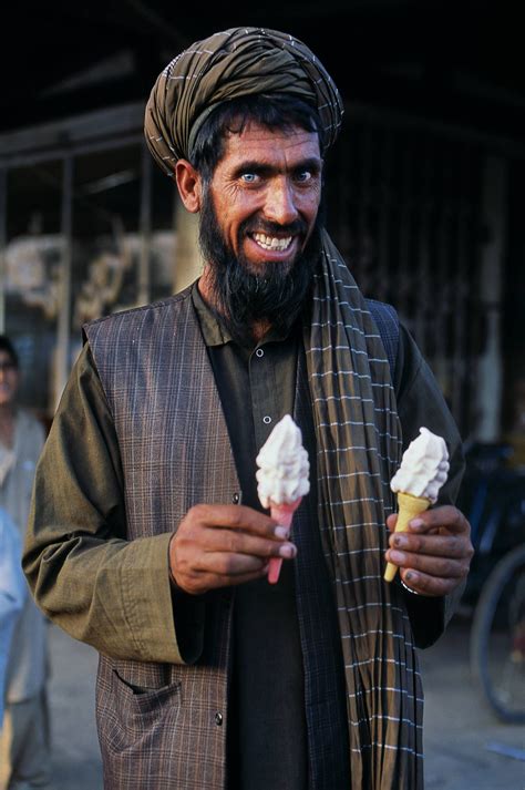 Afghan man holding his ice cream cones, Puli Khumri, Afghanistan. | Steve mccurry, Afghanistan ...