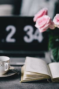 Royalty-Free photo: Lovely roseses, book and coffee | PickPik