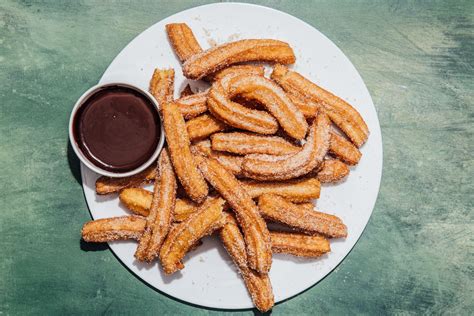 Churros with Bittersweet Chocolate Sauce | Bon Appétit