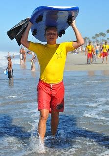 Blue Foam Surfboard | An Oceanside lifeguard carries his foa… | Flickr