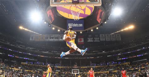 The iconic imagery of LeBron James dunks: Which photo is better? | Sporting News Canada