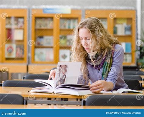 Girl read book in library stock image. Image of girl - 53998105