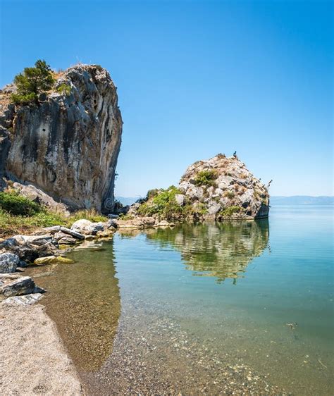 Iznik Lake in Turkey. People Jumping from Cliff Editorial Image - Image of travel, coastline ...